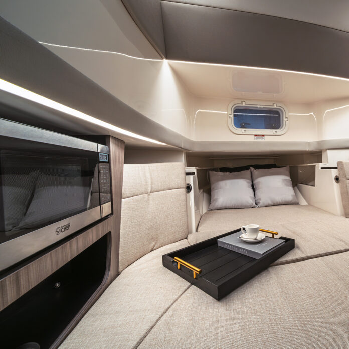 SLX 360 Outboard V-berth sleeping area with filler cushion