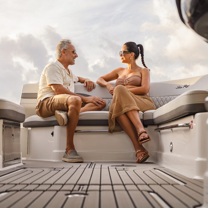 Couple aboard an SLX 360 Outboard